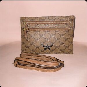MCM Himmel Crossbody Pouch in the Iconic Signature Lauretos Monogram Pattern.
